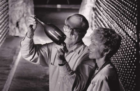 Jack and Jamie Davies inspect a bottle of sparkling wine in Schramsberg's historic wine caves circa 1980