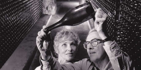 Schramsberg's founder and patriarch, Jack Davies, holds a sparkling wine bottle to inspect fermentation with Jamie Davies in the historic wine caves, circa 1980