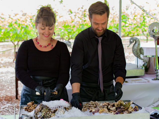 Oysters being shucked at J. Davies Vineyards