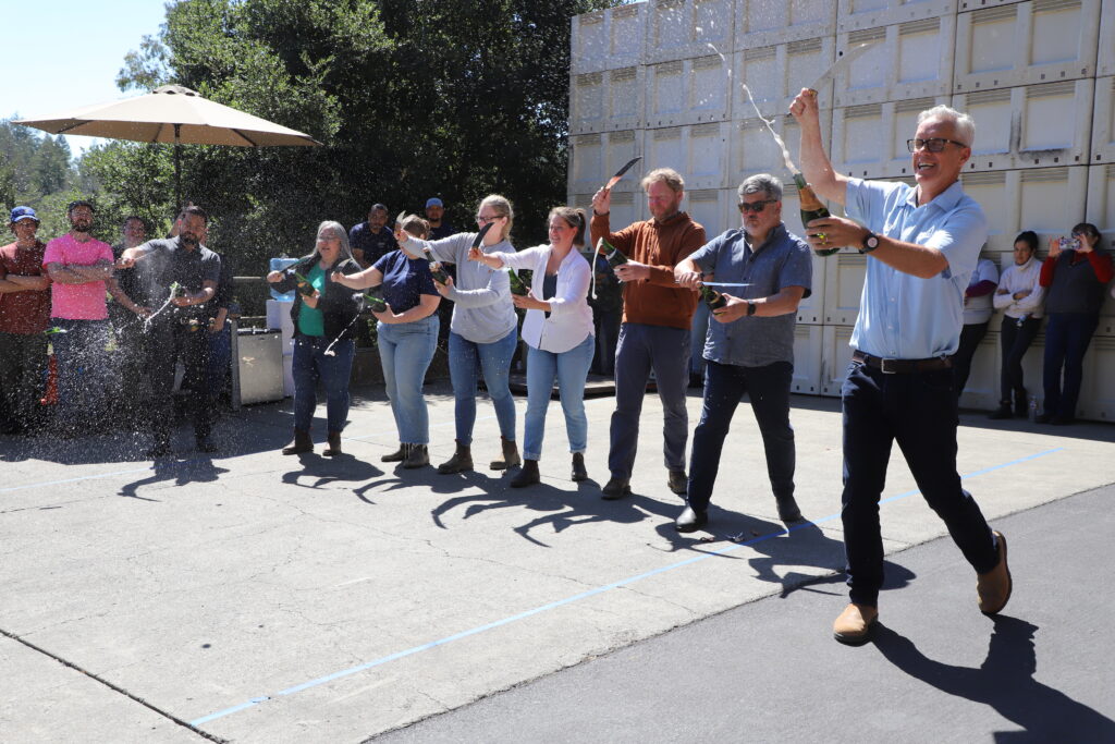 Winemakers Sabering Bottles Open
